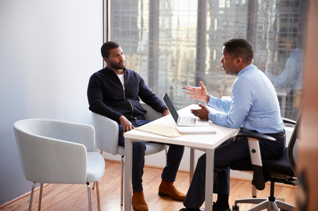 male-speaking-to-a-financial-advisor